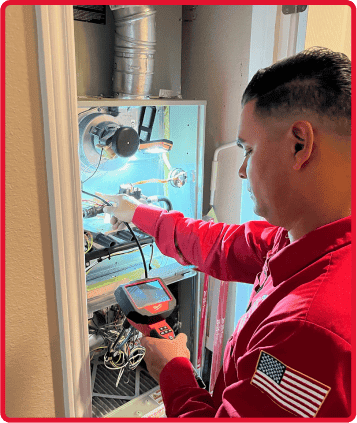 Tech working on furnace