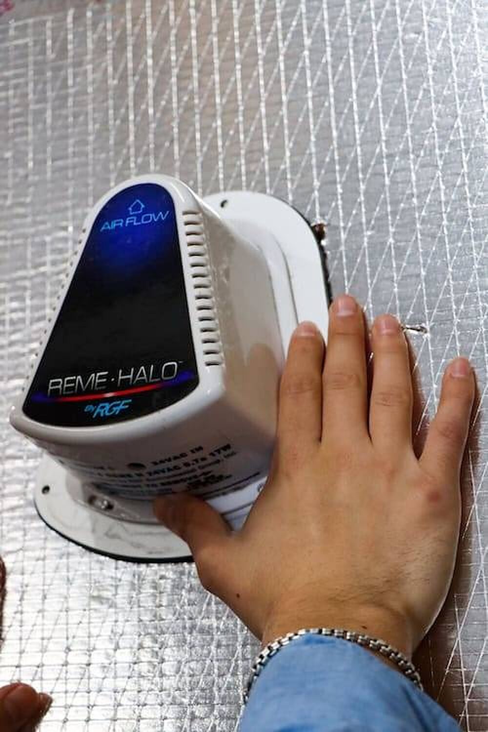 REME HALO whole-home air purifier being installed
