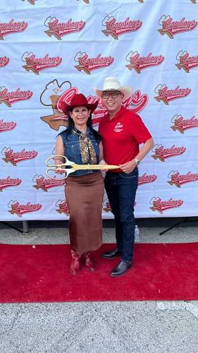 Ribbon cutting outside the Blanco Road shop